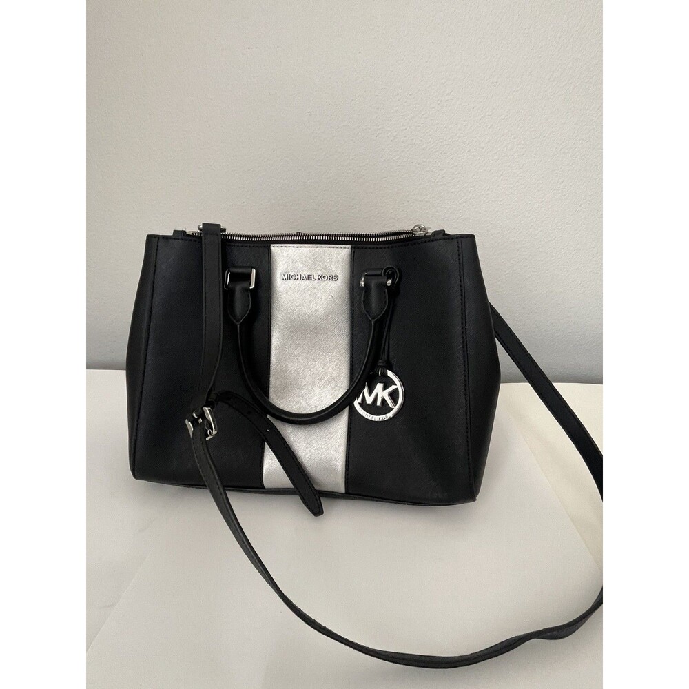 Michael Kors Sutton Saffiano leather satchel handbag W black and silver striped.